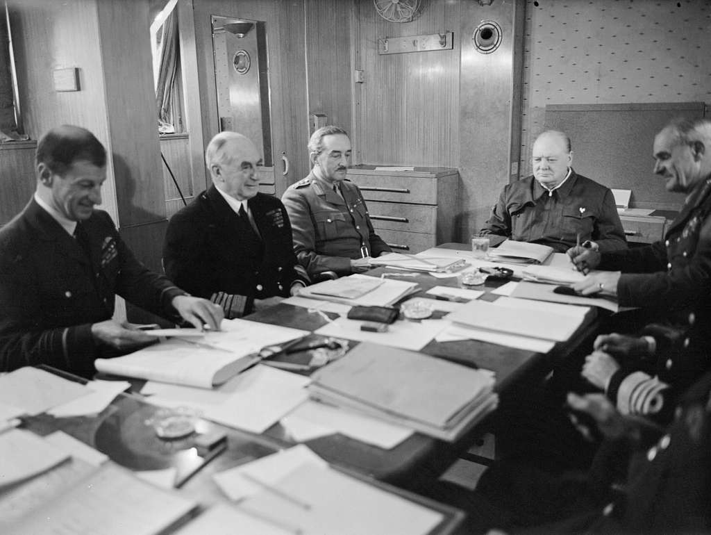 Sir Winston Churchill and his Chief of Staff around a table